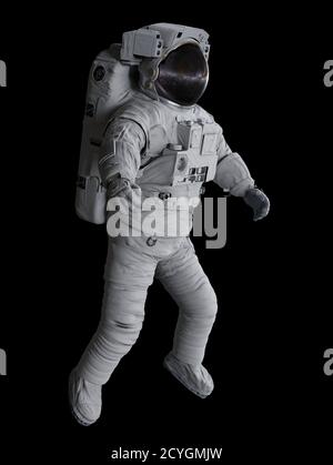 astronaut flying in outer space, isolated on black background Stock Photo