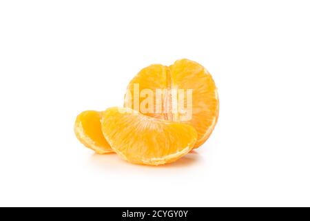 Half of mandarin and pieces isolated on white background Stock Photo