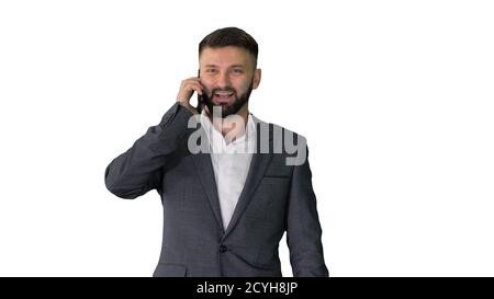 Businessman walking and talking on mobile phone on white backgro Stock Photo