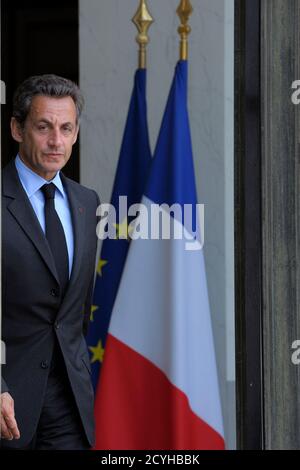 France's President Nicolas Sarkozy waits for President of the European Council Herman Van Rompuy at the Elysee Palace in Paris, June 15, 2011.  REUTERS/Philippe Wojazer  (FRANCE - Tags: POLITICS)