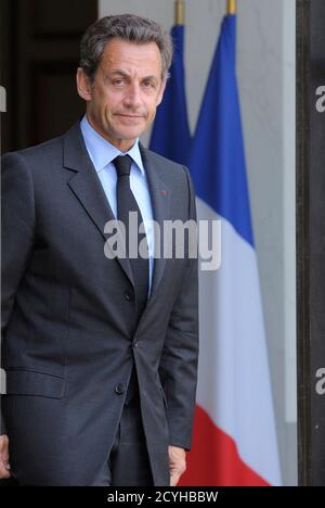 France's President Nicolas Sarkozy waits for President of the European Council Herman Van Rompuy at the Elysee Palace in Paris, June 15, 2011.  REUTERS/Philippe Wojazer  (FRANCE - Tags: POLITICS)