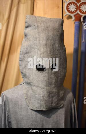 Gray or Grey Penitent Costume & Hood in Colmars-les-Alps Museum Provence France Stock Photo