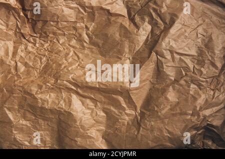 Kraft paper texture for wrapping. Kraft paper texture background. Crumpled brown paper texture background or cardboard surface, for decor design and n Stock Photo