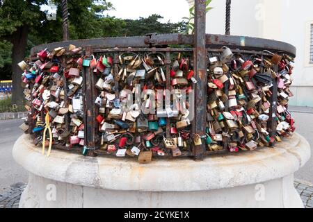 Love locks or love padlocks on iron fence in Vienna, Austria, Europe Stock Photo