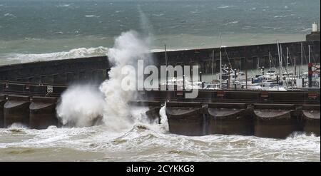 Brighton UK 2nd October 2020 - Waves crash over Brighton Marina as Storm Alex sweeps across Britain bringing strong winds and rain especially in southern areas  : Credit Simon Dack / Alamy Live News Stock Photo