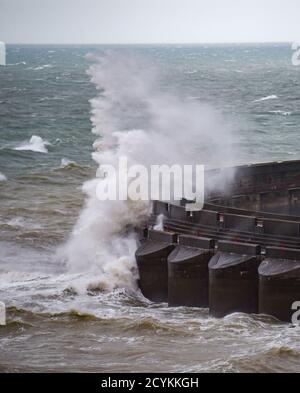 Brighton UK 2nd October 2020 - Waves crash over Brighton Marina as Storm Alex sweeps across Britain bringing strong winds and rain especially in southern areas  : Credit Simon Dack / Alamy Live News Stock Photo