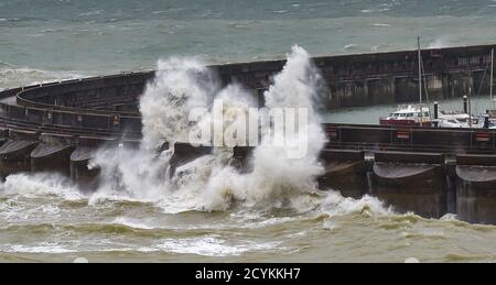 Brighton UK 2nd October 2020 - Waves crash over Brighton Marina as Storm Alex sweeps across Britain bringing strong winds and rain especially in southern areas  : Credit Simon Dack / Alamy Live News Stock Photo