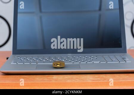 digital security concept. a padlock placed on a laptop computer keyboard to signify safety Stock Photo