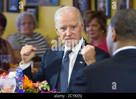 U.S. Vice President Joe Biden speaks with politicians and business owners in a round table discussion on raising the minimum wage at Casa Don Juan restaurant in Las Vegas, October 6, 2014. REUTERS/Las Vegas Sun/Steve Marcus (UNITED STATES - Tags: POLITICS BUSINESS EMPLOYMENT)