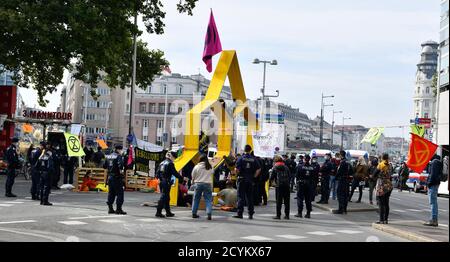Vienna, Austria. 2nd Oct, 2020. After several disruptions in the city, the activists of the 'Extinction Rebellion' blocked another street: Operngasse in the center of Vienna has been closed since last night. Extinction Rebellion Blockade was broken by the police.  Credit: Franz Perc/Alamy Live News Stock Photo