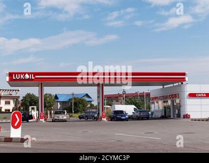 GALATI, ROMANIA - SEPTEMBER 10, 2015. Lukoil gas station with fueling car Stock Photo