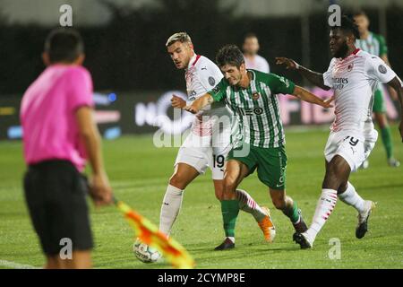 Lucas Piazon of Rio Ave in action with Theo Hernandez and Franck Kessie of Milan during the UEFA Europa League, qualifying play-offs football match be Stock Photo