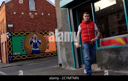 A mural features Irish boxer Michael Conlan winning a bronze medal in the flyweight division at the 2012 Summer Olympics on a wall in the Falls road area of West Belfast February 23, 2013. Historically most of the hundreds of murals across Northern Ireland promoted either republican or loyalist political beliefs, often glorifying paramilitary groups such as the Irish Republican Army or the Ulster Volunteer Force, or commemorating people who lost their lives in paramilitary or military attacks. However, since the paramilitary ceasefires some of the paintings have become less sectarian, celebrat