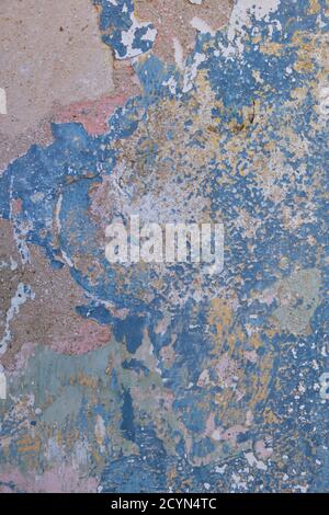 Colorful Painted and weathered pink and blue wall with spots Stock Photo