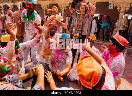 Nandgeon, India, Holi Festival, Feb 25, 2018 - Young men dance during Holi Festival in India Stock Photo