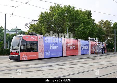 Vienna, Austria. 2nd October 2020. For the first time, the Impf-Bim, a tram operated by Wiener Linien, will be used to support the city of Vienna's free flu vaccination campaign. From October 1 to November 13, 2020, the mobile vaccination center can be found on a total of 31 days for the City of Vienna Health Service at six different locations.  The tram was rebuilt in close cooperation with the MA15. It has a reception area and two separate waiting and vaccination areas. Credit: Franz Perc / Alamy Live News