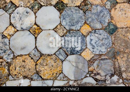 Background pattern from blue and golden tiled floor Stock Photo