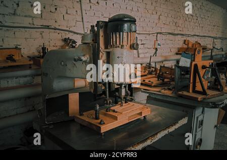 Milling a wooden board. Processing of wood panels on CNC coordinate milling woodworking machines. CNC woodworking machine. Stock Photo