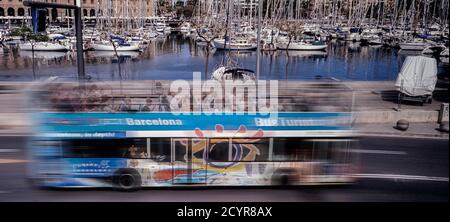 Open top sightseeing tourist double-decker open-top bus at Marina Port Vell. Barcelona. Spain Stock Photo