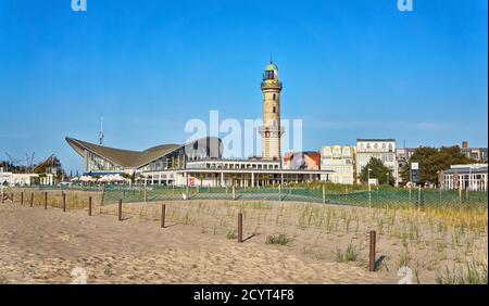 View from the dunes to the city of Warnemünde with tea pot and lighthouse. Stock Photo