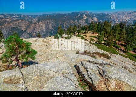 Yosemite summit panorama of half dome, view after hiking in Yosemite National Park at Sentinel Dome. Aerial view of popular El Capitan from Sentinel Stock Photo