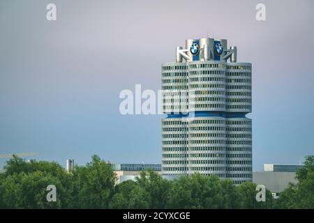 MUNICH, GERMANY - Sep 01, 2020: BMW headquarters in Munich. Modern skyscraper of the Bavarian automobile company in the evening. Stock Photo