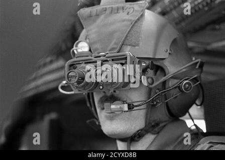 NATO exercises in Germany, US Army helicopter pilot with night viewers  (January 1985) Stock Photo