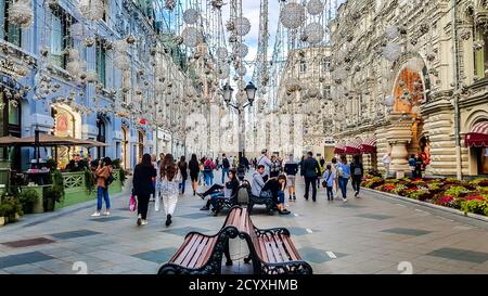 Nikolskaya street decorated by light bulbs, golden rain imitation. Moscow, Russia Stock Photo