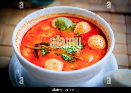 SOPOT, POLEN - 2017 AUGUST 25. Spicy Thai soup Tom Yam with Coconut milk, Chili pepper and Seafood. Stock Photo