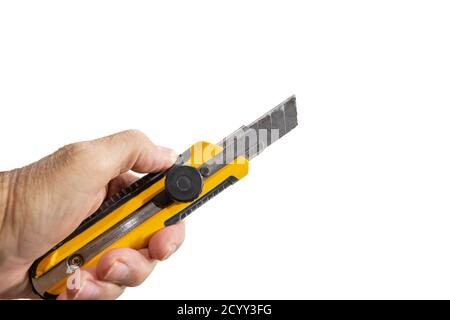 Plastic knife with replaceable blade on white background Stock Photo