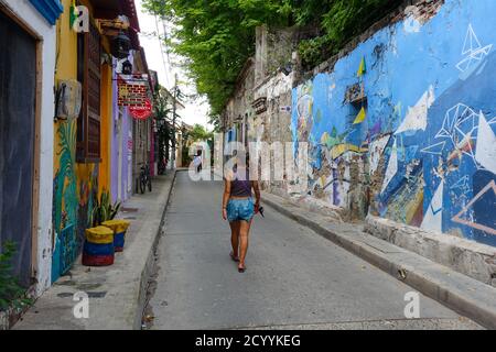 Woman walking the old city during the covid-19 quarantine in Cartagena, Colombia. 2020 Stock Photo