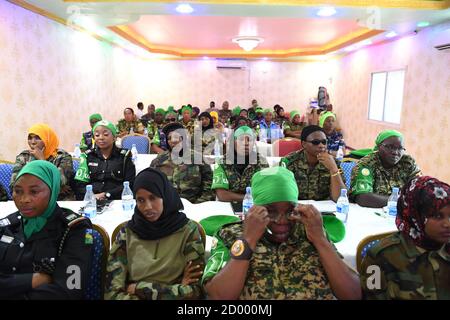 AMISOM female peacekeepers and female soldiers from the Somali National Army (SNA) attend a one-day workshop on empowering female peacekeepers organised by AMISOM's Human Rights, Protection and Gender Unit in Mogadishu on 24 October 2019. Stock Photo