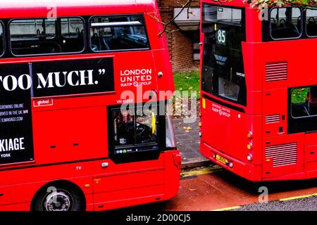 London UK, October 02 2020, Traditional Red Double Decker Bus Parked On The Road Restricted Passenger Numbers Stock Photo