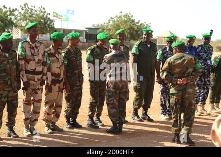 Outgoing AMISOM Sector Four Commander, Col. Mohamed Ibrahim Moussa bids farewell to AMISOM soldiers during his sendoff ceremony in Beletweyne, Somalia, on 16 February 2020. Stock Photo