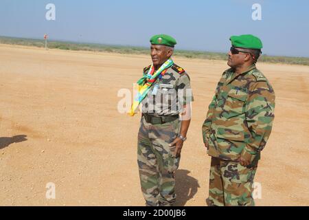 Outgoing AMISOM Sector Four Commander, Col. Mohamed Ibrahim Moussa, faces a guard of honour mounted by AMISOM soldiers in Beletweyne, Somalia, on 16 February 2020. Stock Photo