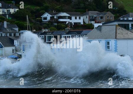 Portmellon, Cornwall. 2nd October 2020. UK Weather Storm Alex Huge Storm force Waves batter houses on the front at Portmellon in Cornwall Friday afternoon. Picture Credit Robert Timoney/Alamy/Live/News Stock Photo