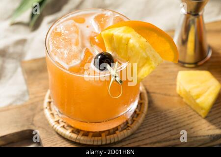 Refreshing Boozy Rum Runner Cocktail with PIneapple and Orange Stock Photo