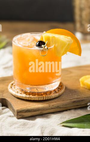 Refreshing Boozy Rum Runner Cocktail with PIneapple and Orange Stock Photo