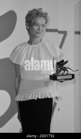 VENICE, ITALY - SEPTEMBER 02: Tilda Swinton poses the Golden Lion for Lifetime Achievement during the 77th Venice Film Festival Stock Photo