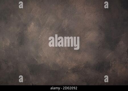 Horizontal brown concrete background with dark scuffs. Stock Photo