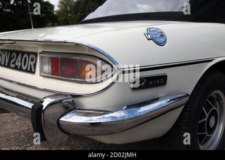 Close up of the rear corner of a Triumph Stag motor car showing petrol cap Stock Photo