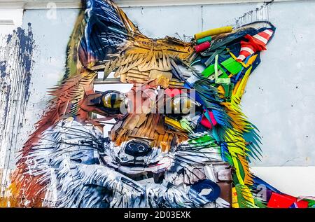 Fox created from objects found in the trash by the artist Bordalo. The facade of almost destroyed warehouse. Lisbon, Portugal Stock Photo