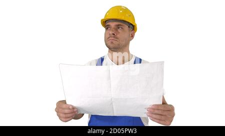 Engineer or Architect or Construction Worker holding blueprint and looking in the result of the work on white background. Stock Photo