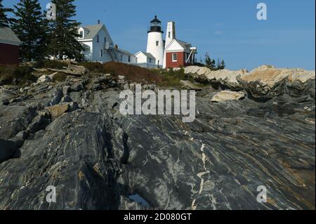 Pemaquid Point lighthouse is located on top of unique metamorphic rock formations in mid coast Maine. It is one of the most popular destinations. Stock Photo