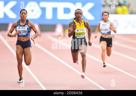 Elaine Thompson (Jamaica), Orlann Ombissa-Dzangue (France). 100 metres, Round 1. IAAF World Athletics Championships, Doha 2019 Stock Photo