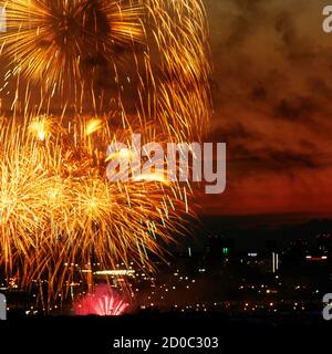Fantastic fireworks over night city Stock Photo