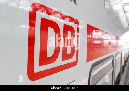 Leipzig, Germany - August 19, 2020: DB logo Deutsche Bahn German railways IC2 Intercity 2 train at Leipzig main station railway in Germany. Stock Photo