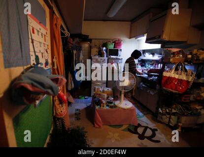 Ririko Saito And Her 11 Year Old Daughter Yumi Relax In Candle Light To Save On Electricity Bills After Dinner At Their Apartment In Tokyo May 14 14 Last Christmas Eve Saito And Her