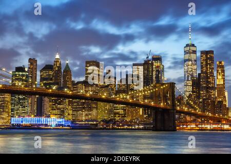 New York City skyline night Manhattan town Brooklyn Bridge USA twilight World Trade Center travel Stock Photo