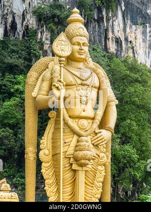 Kuala Lumpur, Malaysia - December 2, 2019: The Lord Murugan statue at the entrance of Batu Caves near Kuala Lumpur, Malaysia. Stock Photo